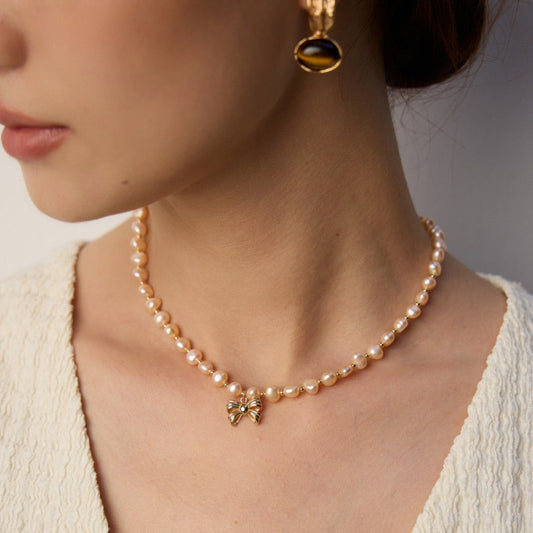 Blush Elegance Freshwater Pearl Necklace with Bow Charm