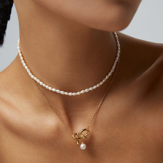 Intertwined Heart Knot Pearl Necklace