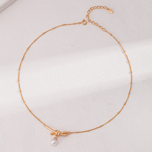Gold Knot Pearl Necklace