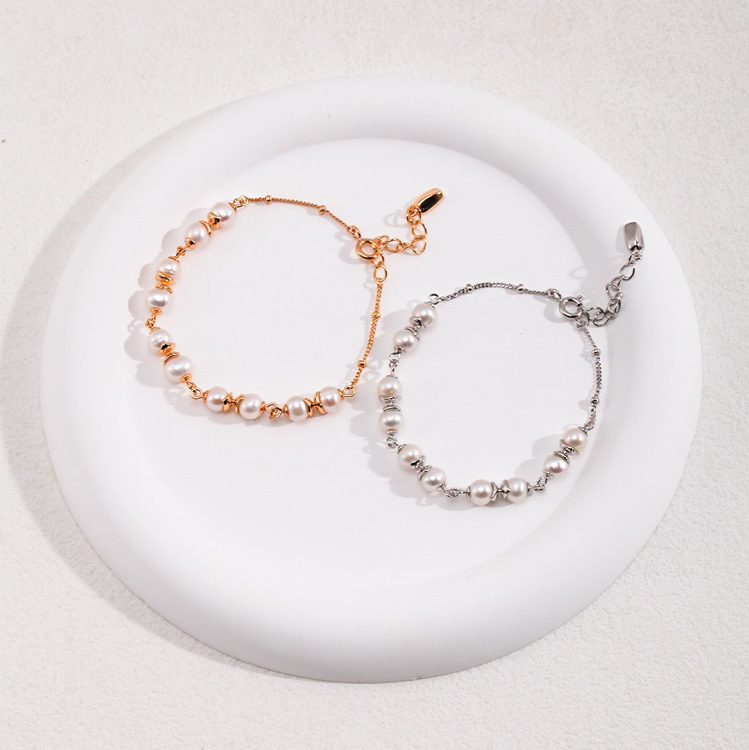 Elegant Interlaced Pearl Bracelet with Sterling Silver